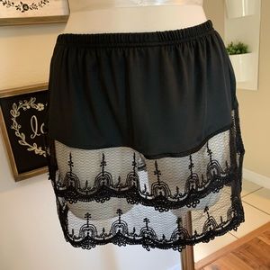 Skirt slip. Under sweater skirt. Black. NEW